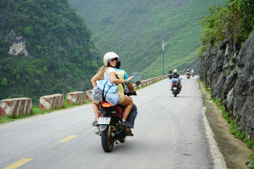 Enjoy-on-the-road-with-Opi-Team-scaled Ha Giang backpacking guide